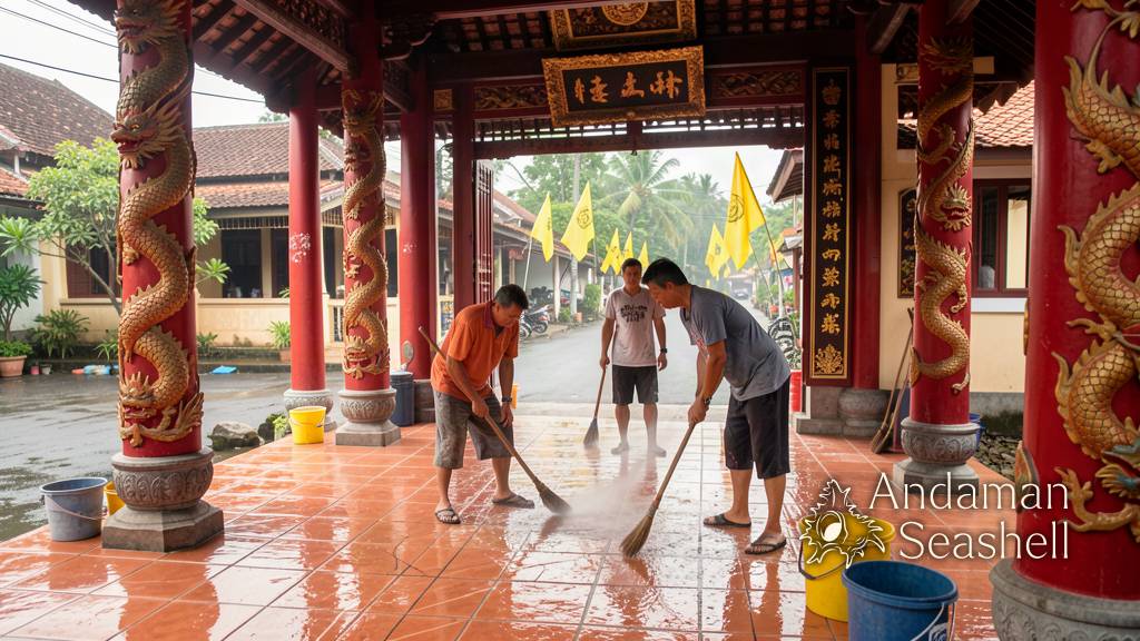 Neighbours washing and polishing a Chinese shrine courtyard in Phang Nga before the festival